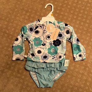 First Impressions 12mns swimsuit. NWT.